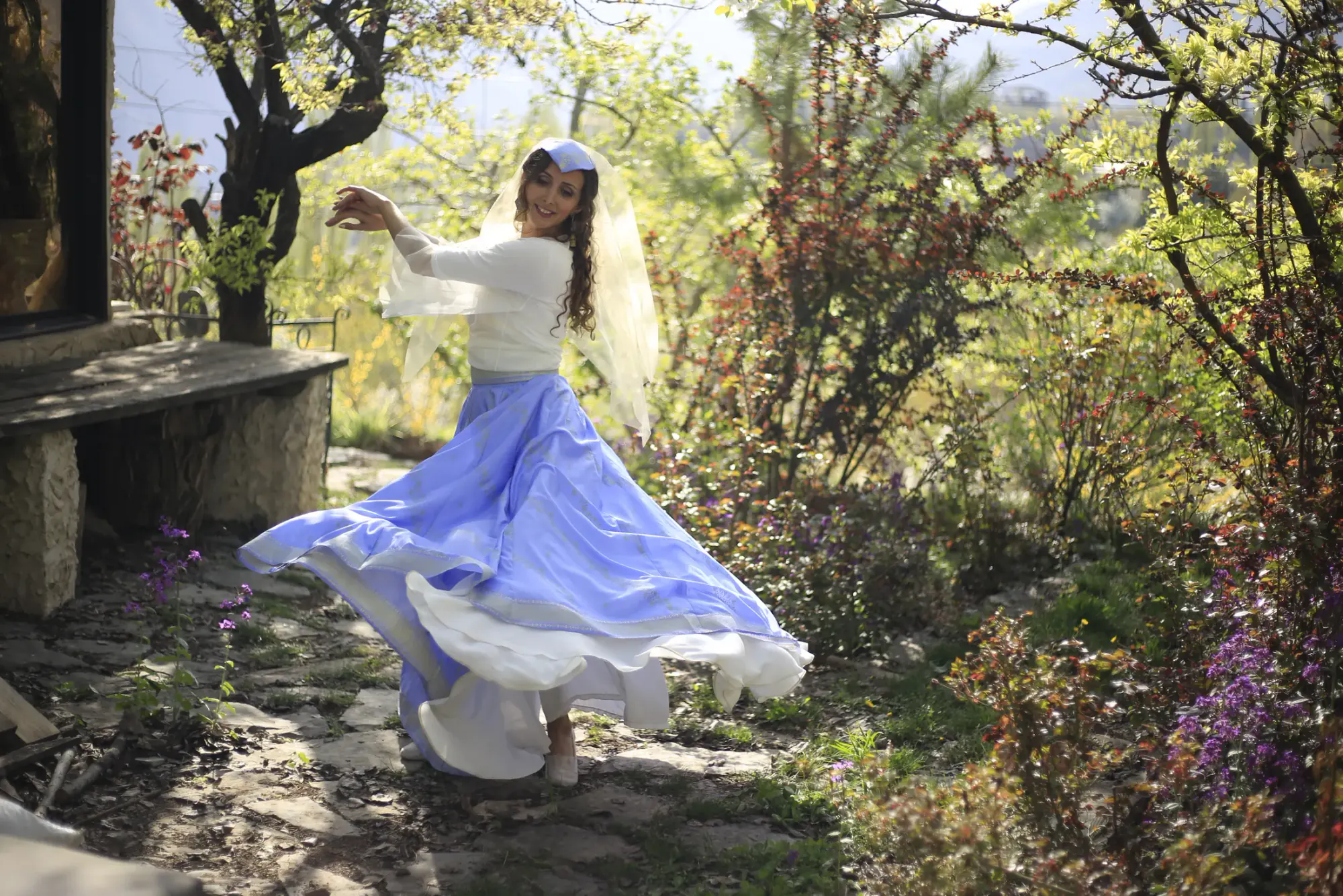 Banafsheh Amiri performing Iranian dance outdoors