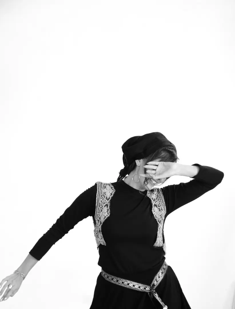 Banafsheh Amiri performing a hand and facial gesture